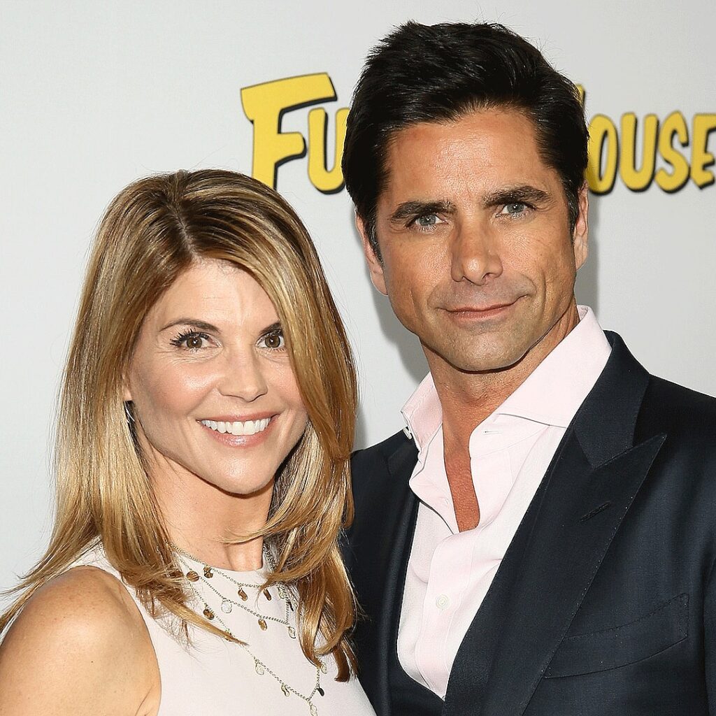 How John Stamos Has Remained Lori Loughlin’s Fierce Defender