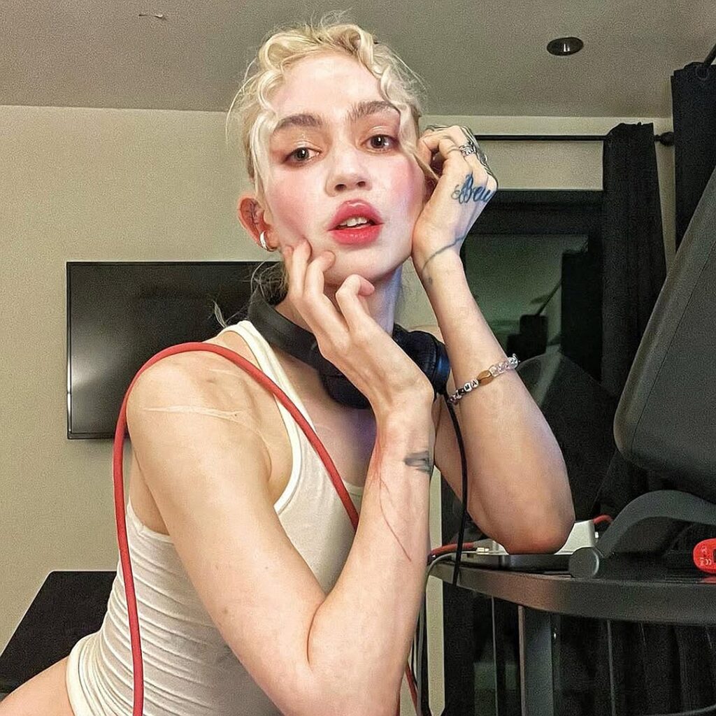 Grimes Unveils Large Face Tattoo