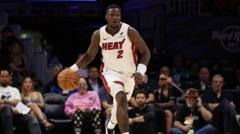 Portland Trail Blazers coach and Miami Heat player arrested in NBA gambling case