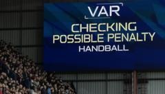 Why are handball calls causing confusion in Scottish Premiership?