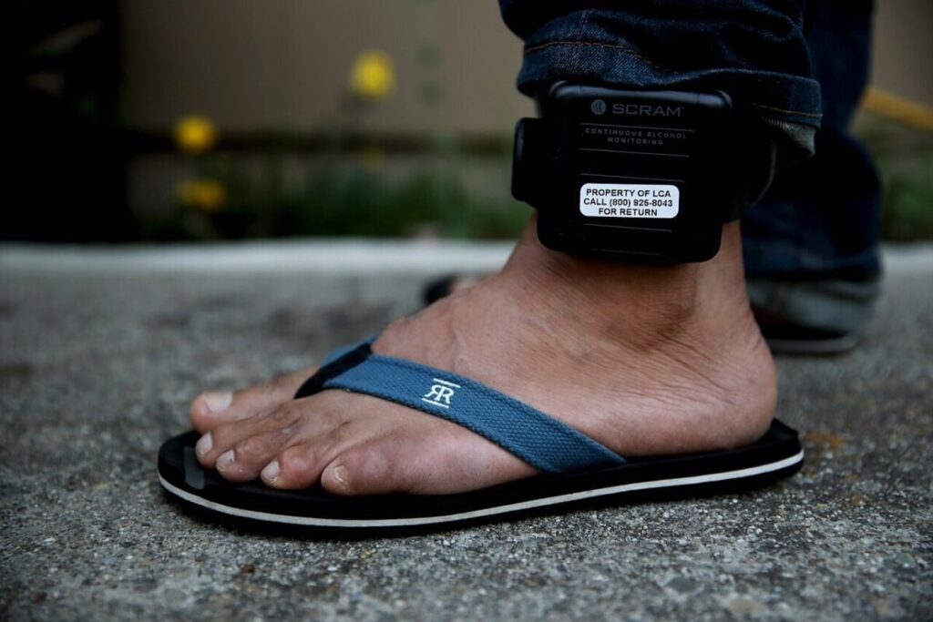 ICE’s Biggest Contractor Seeks Ankle Monitor Revenue Amid Government Shutdown