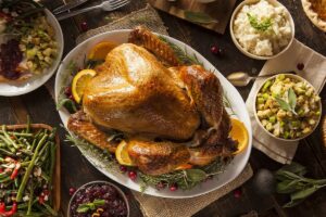 Trump claims Thanksgiving is cheaper this year — even as Americans spend hundreds on turkey and travel