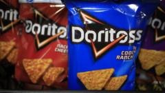 Armed police handcuff teen after AI mistakes crisp packet for gun in US