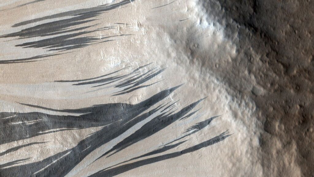 2 million black ‘streaks’ on Mars finally have an explanation, solving 50-year mystery