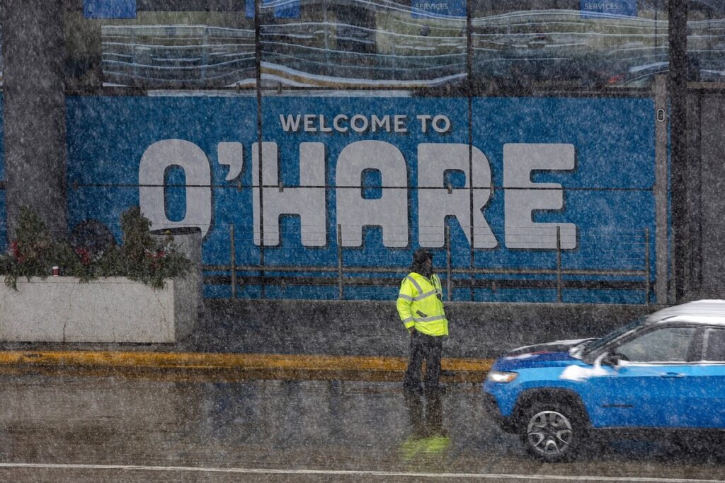 Airlines cancel 2,500 flights, roll out waivers, as storm disrupts Thanksgiving return