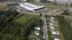 How families could get stuck with higher electric bills if the AI data center boom goes bust