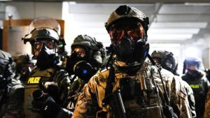 ICE protester who identified as ‘bin Laden’ faces charges over alleged sexually explicit threats to agents