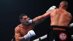 Opetaia retains titles with Cinkara knockout