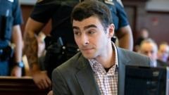 Mangione in court as lawyers seek to rule out notebook, gun and other key evidence